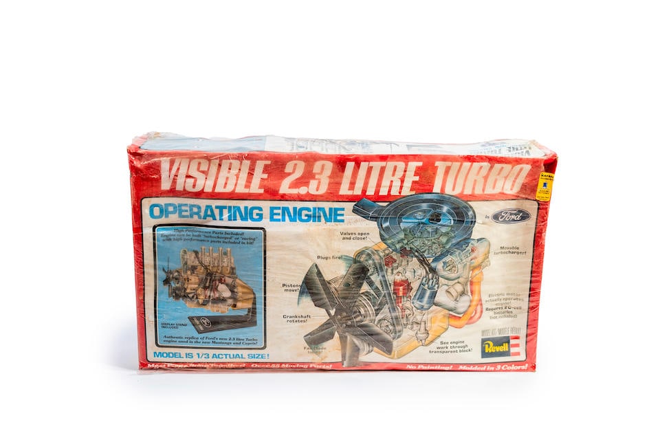 A visible 2.3 Liter Ford engine model,: A visible 2.3 Liter Ford engine model, new in box, box slightly crushed on corner contents intact. Lot to be sold without reserve. For further information on this lot please visit Bonhams.com For furt