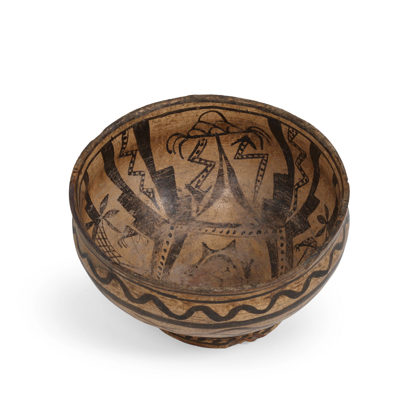 A Cochiti pictorial pottery bowl: A Cochiti pictorial pottery bowl A footed circular bowl densely decorated on the exterior with continuous geometric and cloud bands, with additional raincloud, lightning and geometric designs on the i