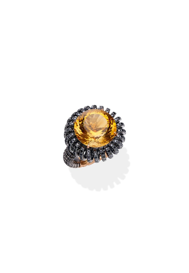 PAOLO COSTAGLI | CITRINE AND BLACK DIAMOND RING: PAOLO COSTAGLI | CITRINE AND BLACK DIAMOND RING Centred by a circular-cut citrine with known weight 9.75 carats, to a scrolling openwork mount set with brilliant-cut black diamonds, estimated total d