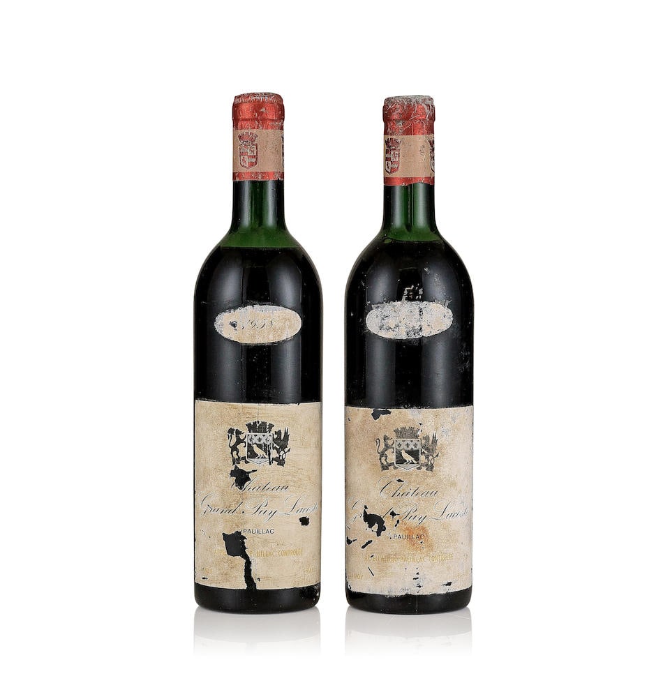 Château Grand-Puy-Lacoste, 1958 (2 x 750ml): Château Grand-Puy-Lacoste, 1958 (2 x 750ml) Region: Pauillac Fill Level: 1x mid shoulder, 1x high shoulder Capsule: corroded and wrinkled, négociant Julien Damoy Ivry capsules Cork: ok Label