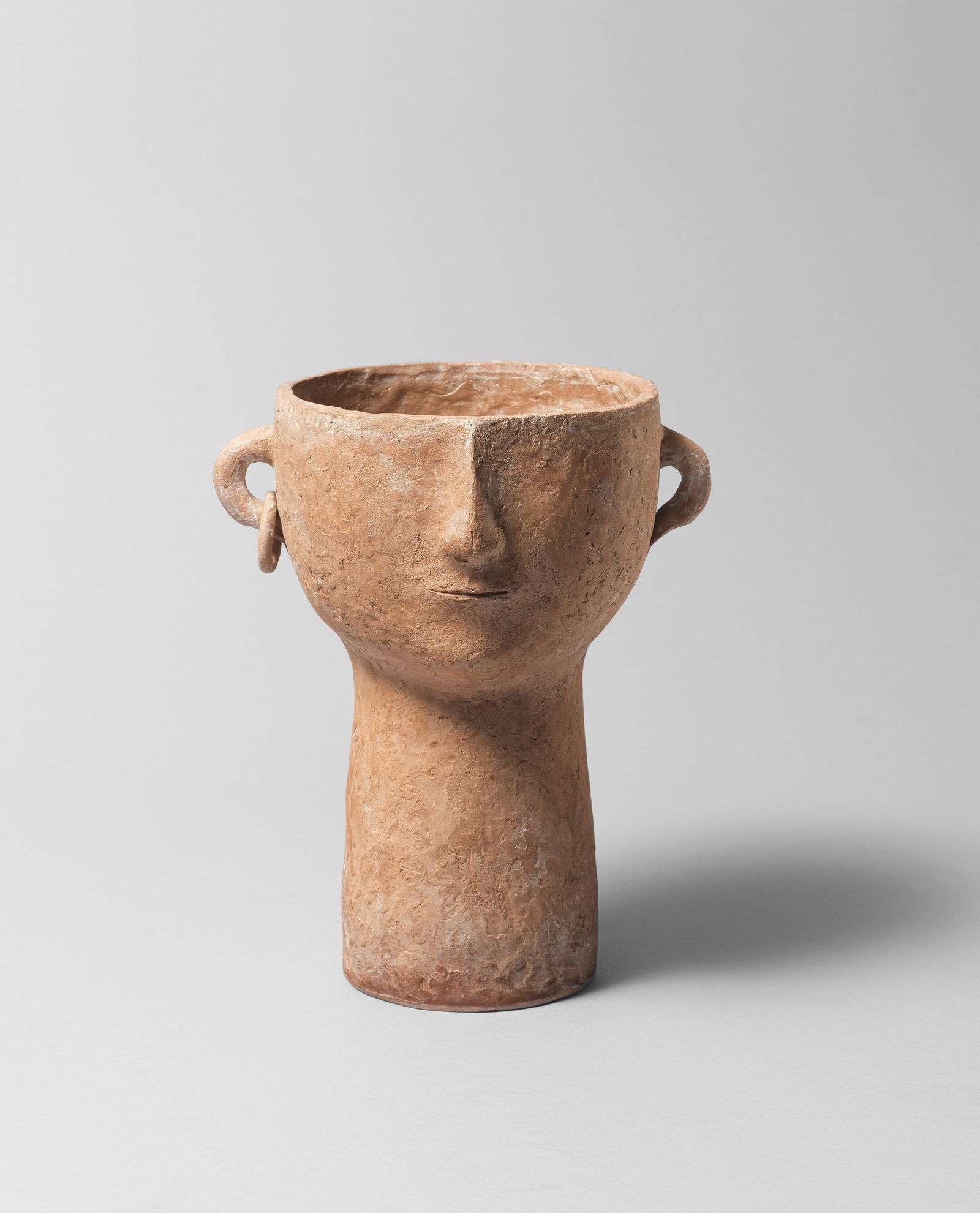 Jewad Selim (Iraq, 1919-1961) Head (Vase) height: 27cm: Jewad Selim (Iraq, 1919-1961) Head (Vase) terracotta executed in 1955 height: 27cm Footnotes: Provenance: Property from the Estate of the Artist Exhibited: Fourth Exhibition of the Baghdad Mode