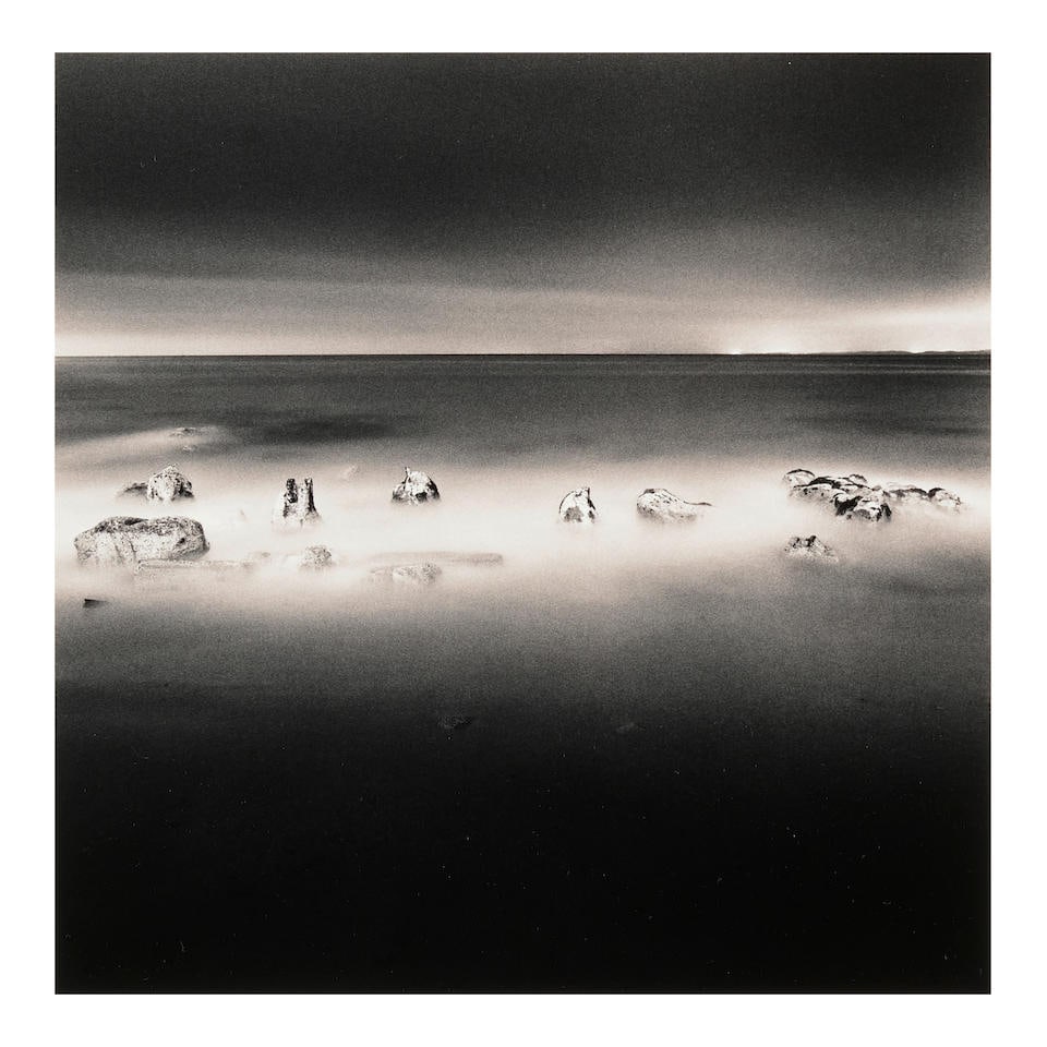 Michael Kenna (born 1953); 'Sea Stones, Monterey, California, U.S.A.';: Michael Kenna (born 1953) 'Sea Stones, Monterey, California, U.S.A.', 1992 Sepia-toned gelatin silver print; mounted, signed, dated, and editioned '2/45' in pencil on the mount, the photographer's cre