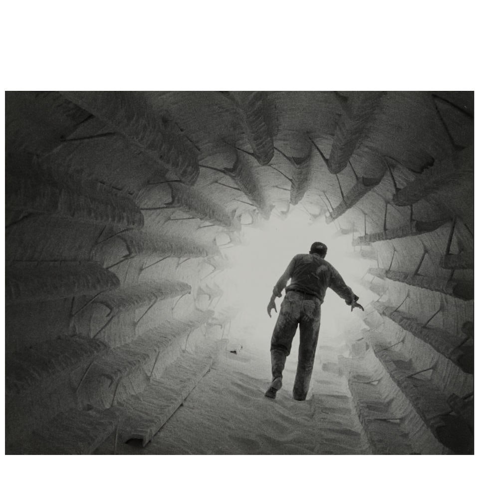 W. Eugene Smith (1918-1978); Detergent Factory (from 'The Reign of Chemistry');: W. Eugene Smith (1918-1978) Detergent Factory (from 'The Reign of Chemistry'), 1953 Gelatin silver print, printed before 1978; the photographer's estate stamp on the reverse. 10 5/8 x 13 5/8 in. (27 x