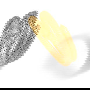 AN 18K GOLD AND RUBY BRACELET: AN 18K GOLD AND RUBY BRACELET Designed as a coiled serpent with round ruby eyes, inner circumference 7 1/2 in. (flexible) Footnotes: OVERALL CONDITION: Metal stamped and tested with XRF (X-ray fluores