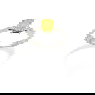 FANCY YELLOW DIAMOND RING: FANCY YELLOW DIAMOND RING The Fancy Intense Yellow cushion-shaped diamond weighing 1.07 carats, mounted in platinum, UK hallmark, ring size approx. K Footnotes: GIA: 1.07 carats, Fancy Intense Yellow