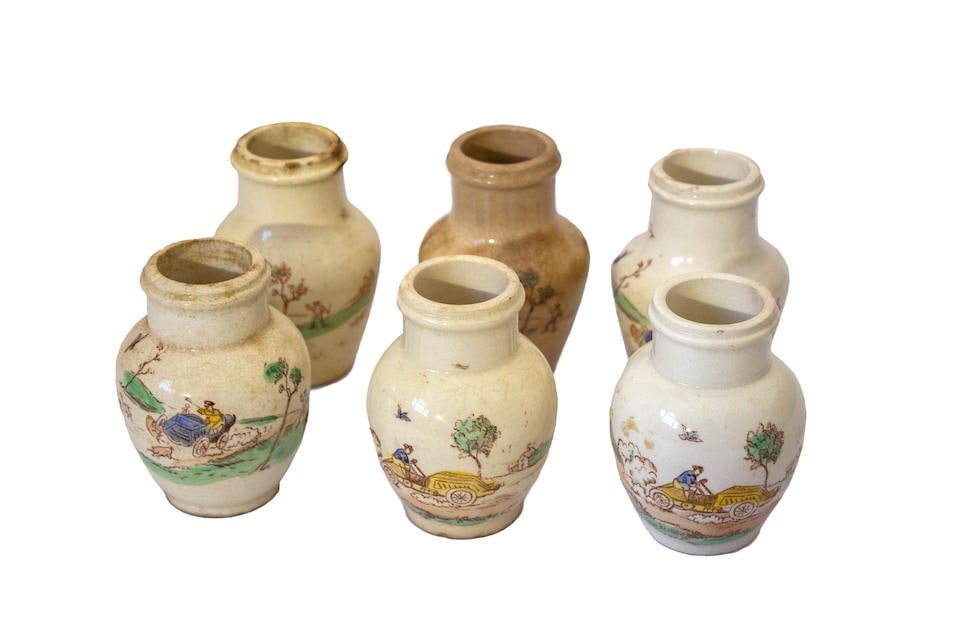 A grouping of 6 French, miniature vases with images of Veteran automobiles at speed, circa 1905, (1 of 2)