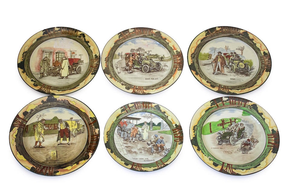 A group of 10, Royal Doulton 'Series Ware' motoring themed plates by George Holdcroft, circa 1906,: A group of 10, Royal Doulton 'Series Ware' motoring themed plates by George Holdcroft, circa 1906, each hand-colored underglaze and decorated with an early humorous motoring scene, titled 'A Nerve Ton
