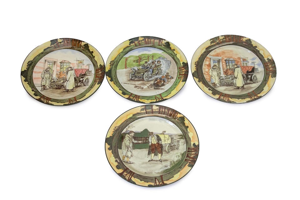 A group of 10, Royal Doulton 'Series Ware' motoring themed plates by George Holdcroft, circa 1906,: A group of 10, Royal Doulton 'Series Ware' motoring themed plates by George Holdcroft, circa 1906, each hand-colored underglaze and decorated with an early humorous motoring scene, titled 'A Nerve Ton