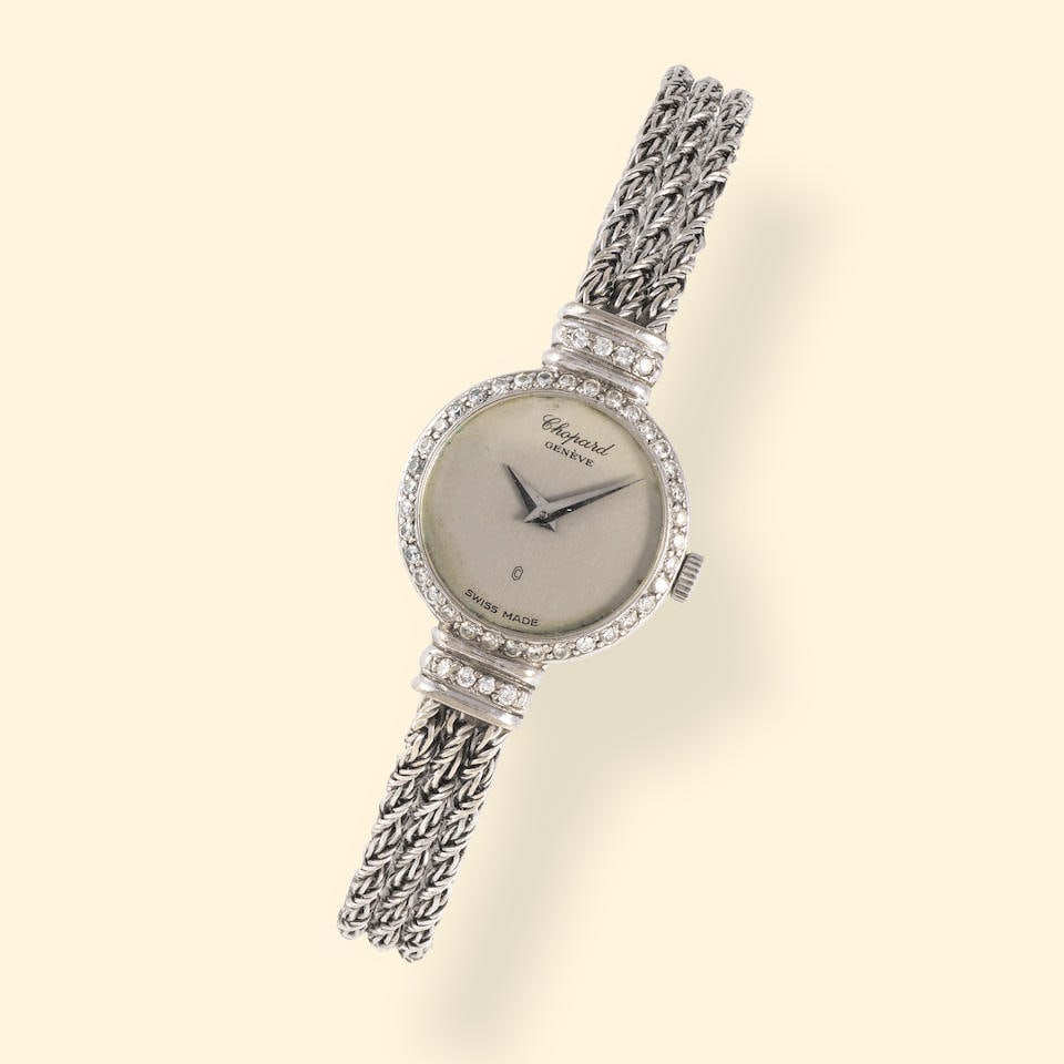 Chopard. A lady's 18K white gold quartz bracelet watch with diamond set bezel Chopard. Montre br... (1 of 1)