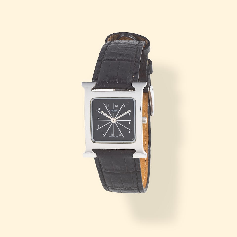 Hermès. A stainless steel quartz wristwatch Hermès. Montre bracelet en acier mouvement... (1 of 1)