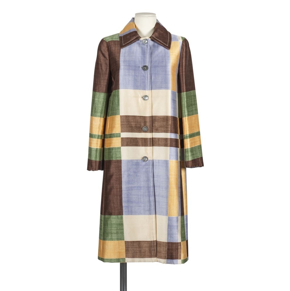 Prada, collection Prêt à Porter . Manteau en laine et soie imprimée multicolore. ...: Prada, collection Prêt à Porter . Manteau en laine et soie imprimée multicolore. Directrice artistique: Miuccia Prada. Petit col, simple boutonnage. Condition d'état: A. Taille/Siz