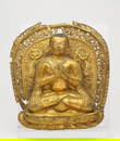 A gilt copper alloy repouss&#233; figure of a Lama 15th/ 16th century