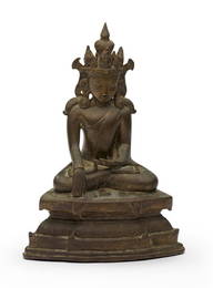 A copper alloy figure of a seated Buddhist deity, possibly Avalokitesvara, the Bodhisattva of Co...