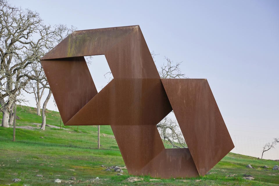 CHARLES GINNEVER (1931-2019) Gemini (from the Flat Illusion Series), 1987: CHARLES GINNEVER (1931-2019) Gemini (from the Flat Illusion Series), 1987 signed and dated 'C. Ginnever 1987' (on the base) cor-ten steel 148 1/2 x 184 1/2 x 46 1/2 in. 377.2 x 468.6 x 117.5 cm. Footn
