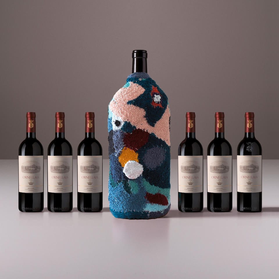 Ornellaia 'La Determinazione' 6 liter signed by Pascale Marthine Tayou, 2022 AND Vertical Ornell...: Ornellaia 'La Determinazione' 6 liter signed by Pascale Marthine Tayou, 2022 AND Vertical Ornellaia, 2015 - 2020 (6x 750ml, 1x 6 liter) Region: Tuscany Label: 6 liter is bottle 10 of 10 Footnotes: Thi
