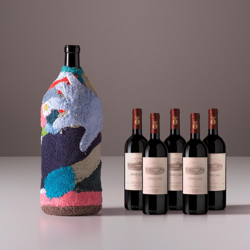 Ornellaia 'La Determinazione' 6 liter signed by Pascale Marthine Tayou, 2022 AND Vertical Ornell...: Ornellaia 'La Determinazione' 6 liter signed by Pascale Marthine Tayou, 2022 AND Vertical Ornellaia, 2005 - 2009 (5x 750ml, 1x 6 liter) Region: Tuscany Label: 6 liter is bottle 6 of 10 Footnotes: This