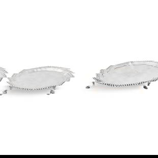 Two Sterling Silver Waiters,: Two Sterling Silver Waiters,  one London, 1764, Ebenezer Coker, maker, gadrooned border and armorial to center, on pad feet on platforms, dia. 7; the other Birmingham, 1968, J B Chatterley & Sons Ltd,