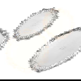 Two Georgian Sterling Silver Salvers,: Two Georgian Sterling Silver Salvers, one London, 1742, Thomas Farren, maker, pie crust edge intersected by shells, crest to center, the underside monogrammed 'G/ R*S' with the scratch weight 16=13