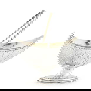 George III Sterling Silver Sugar Basket,: George III Sterling Silver Sugar Basket,  London, 1789, Robert Hennell, maker, in the Neoclassical style, ovoid with a reeded swing handle, bright-cut engraving surrounding the monogrammed cartouche,