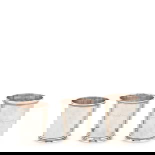 Three Coin Silver Julip Cups,: Three Coin Silver Julip Cups, mid-19th century, one H & J Deckelman, Kansas (?) with beaded border and the inscription 'Jacob Everhardy', ht. 3 7/8; one Blynn & Baldwin, Cincinnati, Ohio, 'Donald Edw