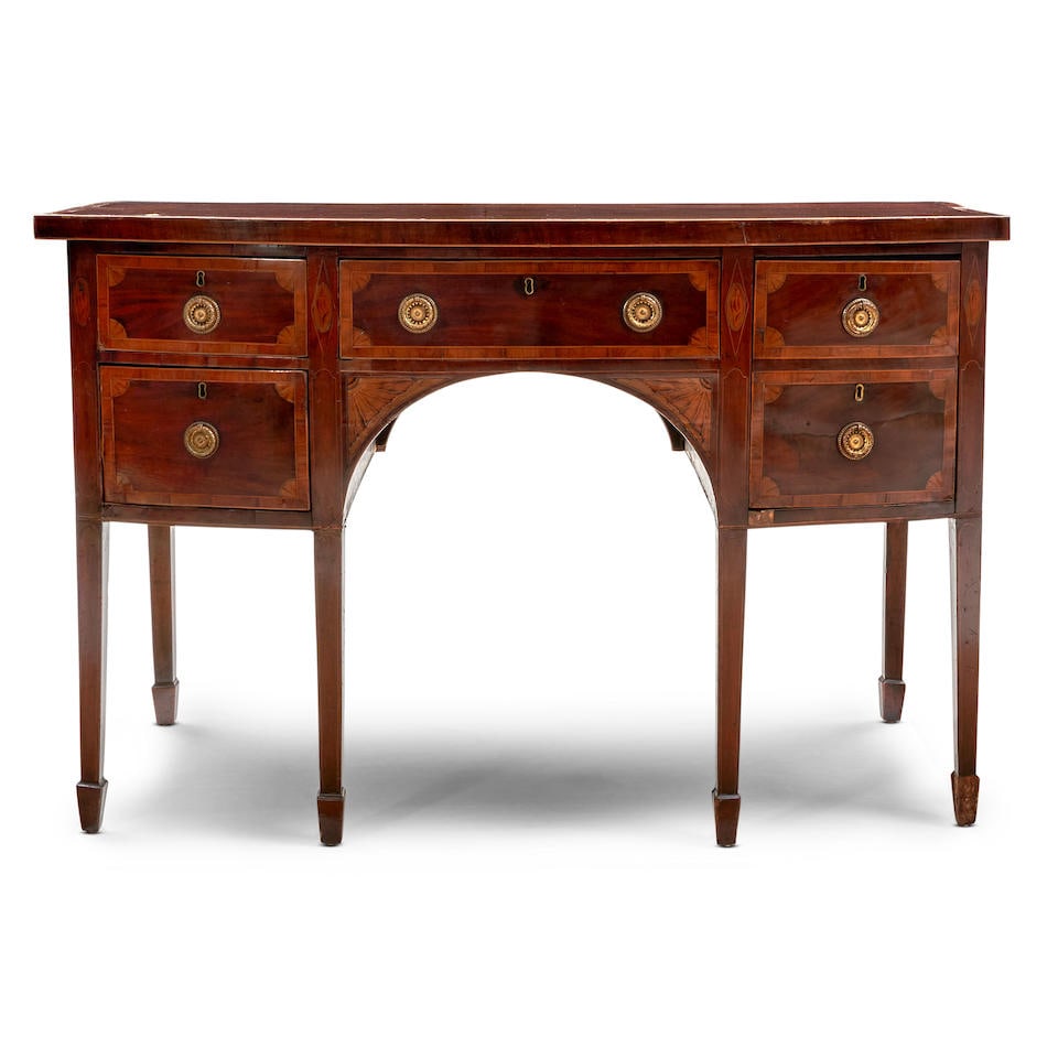 George III Mahogany Sideboard, England, late 18th century,: George III Mahogany Sideboard, England, late 18th century, the bow front top with cross banding and stringing above a conforming case with central drawer flanked by a large cabinet and two graduated d