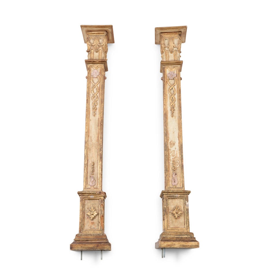 Pair of Italian Neoclassical-style Creme Painted and Parcel Gilt Columns: Pair of Italian Neoclassical-style Creme Painted and Parcel Gilt Columns late 19th/early 20th century, with scrollwork and floral motifs, ht. 56 in. For further information on this lot please visit Bo