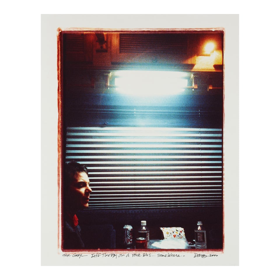 Danny Clinch (American, born 1964): Jeff Tweedy on a Tour Bus... Somewhere, 2000, printed later,: Danny Clinch (American, born 1964): Jeff Tweedy on a Tour Bus... Somewhere, 2000, printed later, archival photographic print, inscribed For Gary and signed and dated in black ink by the photographer,