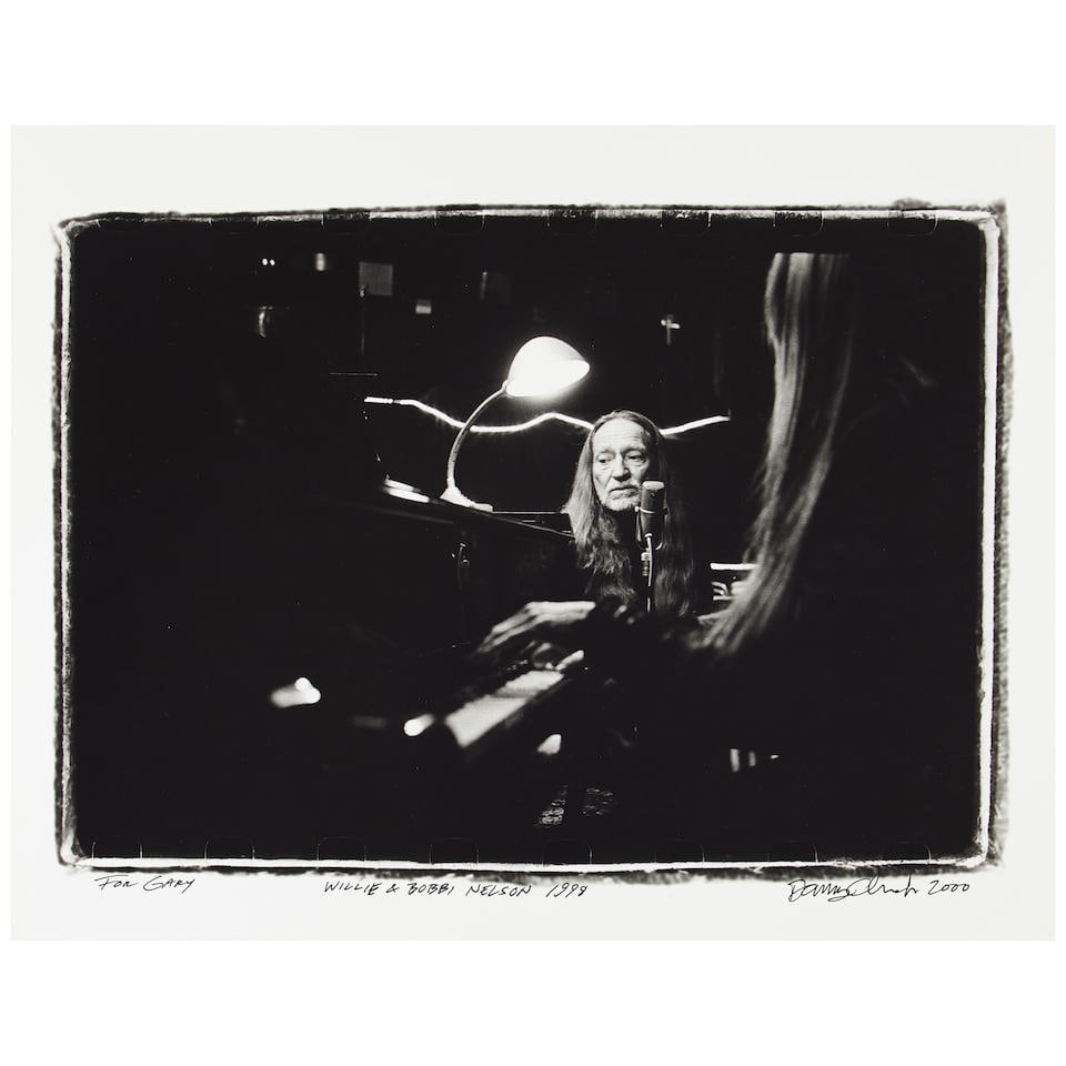 Danny Clinch (American, born 1964): Willie & Bobbi Nelson, 1998, printed later,: Danny Clinch (American, born 1964): Willie & Bobbi Nelson, 1998, printed later, archival photographic print, inscribed For Gary and signed and dated in black ink by the photographer, 14 x 11in Lot to