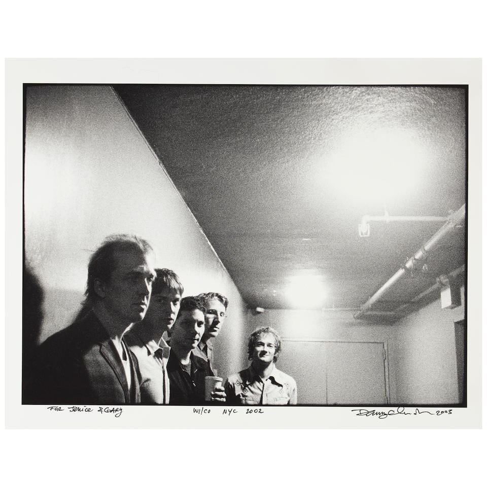 Danny Clinch (American, born 1964): Wilco NYC, 2002, printed later,: Danny Clinch (American, born 1964): Wilco NYC, 2002, printed later, archival photographic print, inscribed For Jenice & Gary and signed and dated in black ink by the photographer, 14 x 11in Lot to be