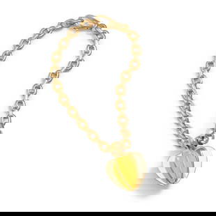 CARTIER: AN 18K GOLD BRACELET, FRANCE: CARTIER: AN 18K GOLD BRACELET, FRANCEDesigned as an apple suspended from a chain; signed Cartier, no. 950755; with French assay mark; length 7¼ in, pendant length 1 in