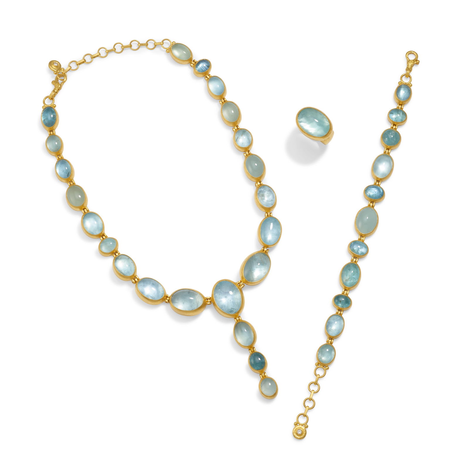GURHAN: AN AQUAMARINE NECKLACE, BRACELET AND RING SET: GURHAN: AN AQUAMARINE NECKLACE, BRACELET AND RING SET Composed of bezel-set oval-shaped cabochon aquamarines; signed GURHAN, no. RG969, BF94F and NK415; mounted in 24K gold; necklace longest 17 in; br