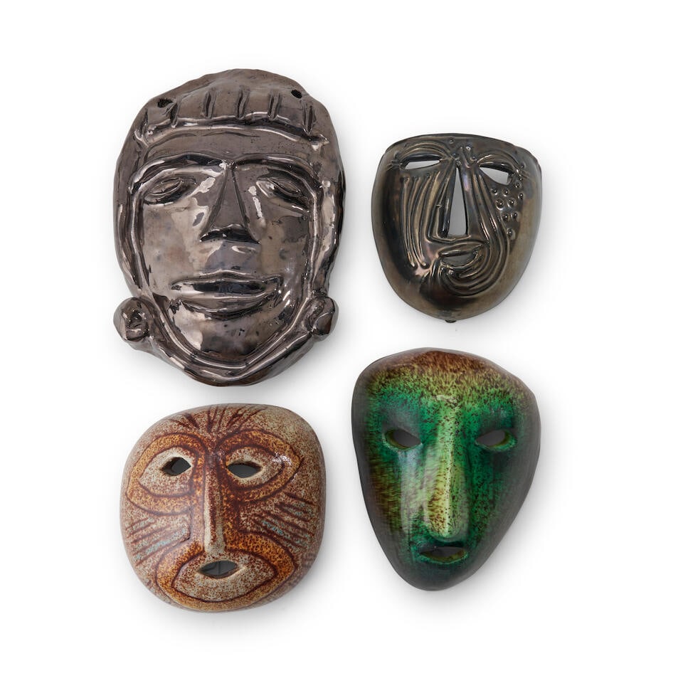 FOUR ACCOLAY MASKS Accolay, France, c. 1960, glazed ceramic, all with either incised or painted...: FOUR ACCOLAY MASKS Accolay, France, c. 1960, glazed ceramic, all with either incised or painted 'Accolay' marks, ht. 5 3/4 to 10 1/4 in. Footnotes: Note Following World War II, a group of young cerami