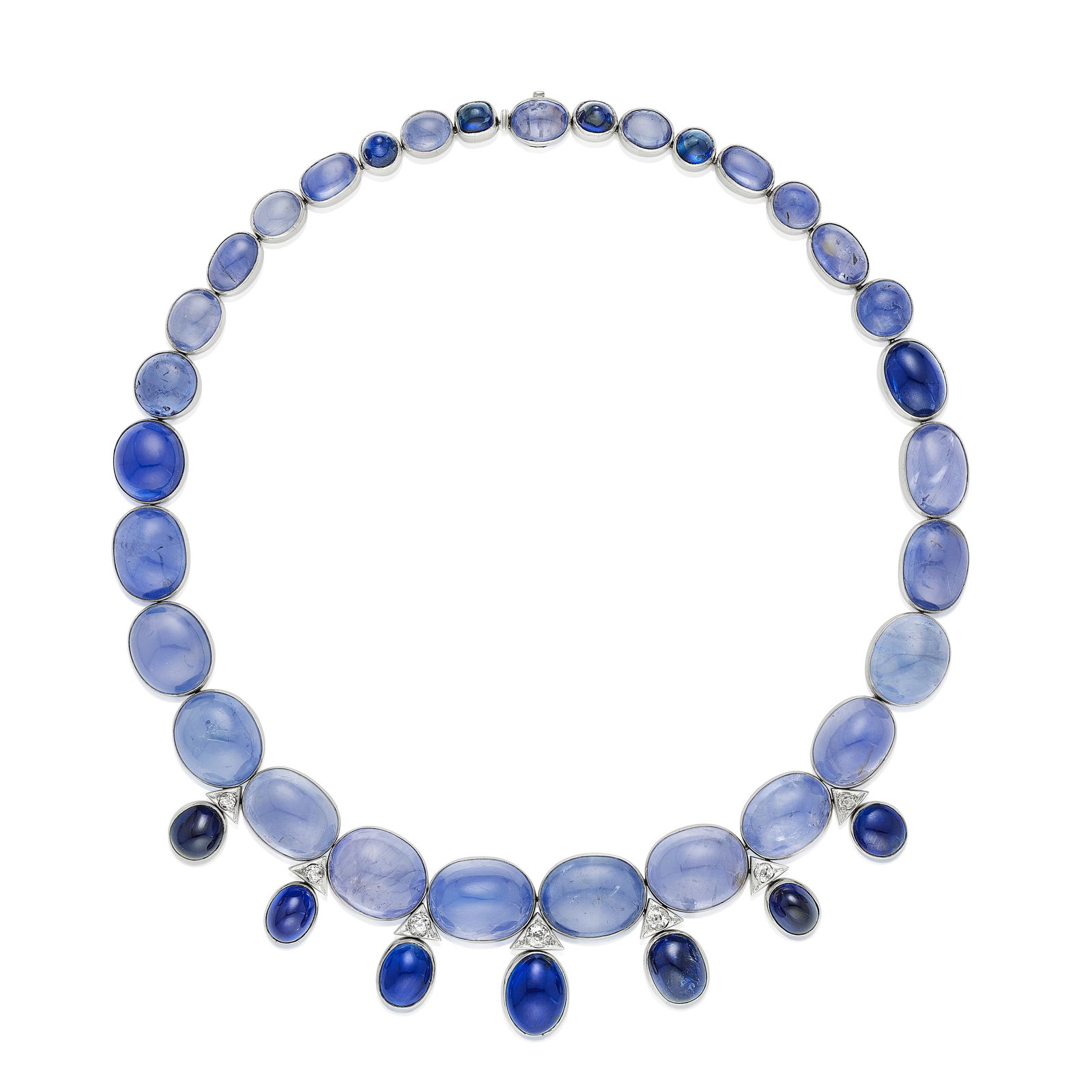 SUZANNE BELPERRON: A SAPPHIRE AND DIAMOND NECKLACE, FRANCE: SUZANNE BELPERRON: A SAPPHIRE AND DIAMOND NECKLACE, FRANCE Composed of graduated cabochon sapphires suspending seven oval-shaped cabochon sapphires at the front, with old European-cut diamond accents;