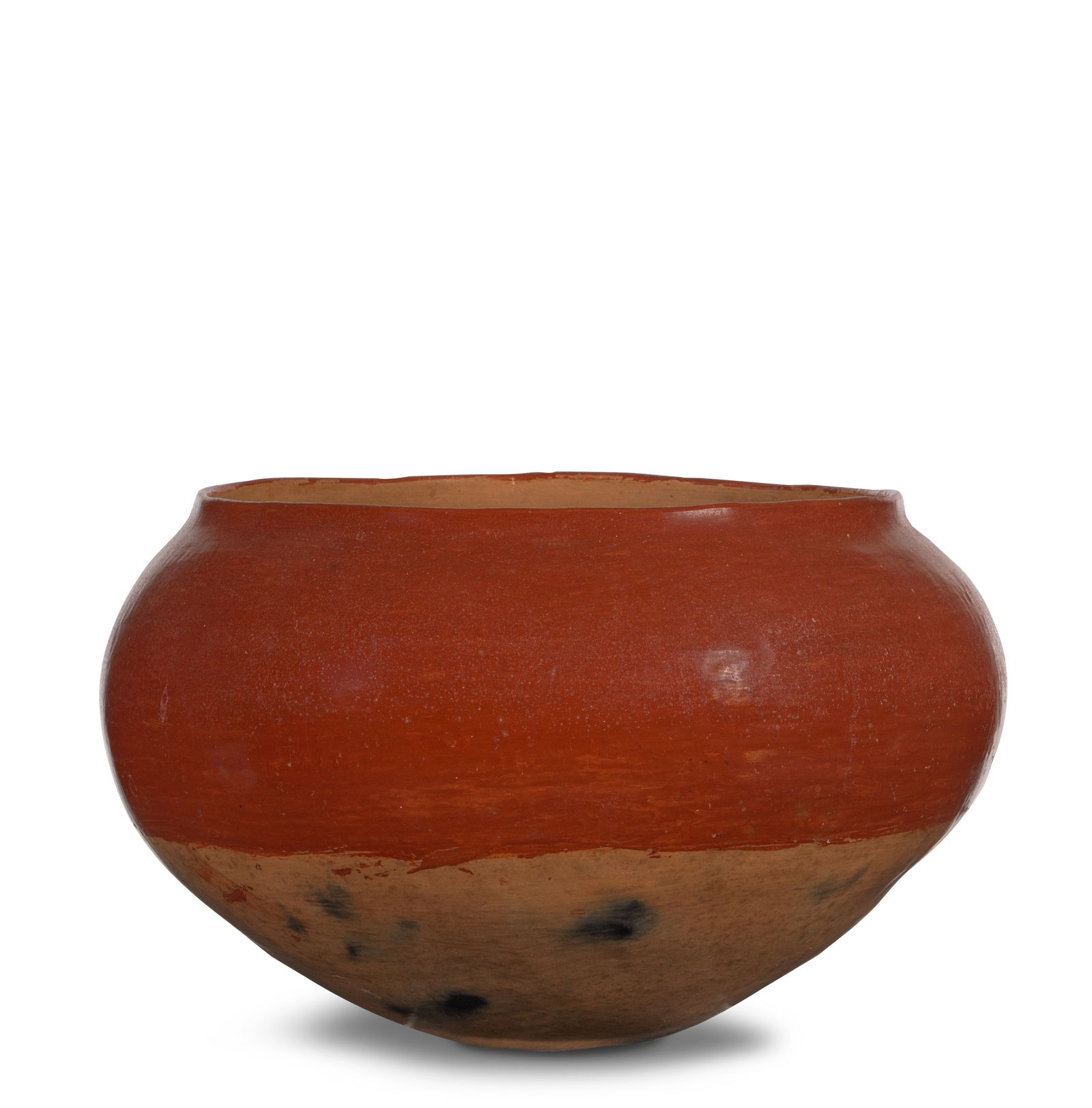 A Ohkay Owingeh (San Juan) polished redware bowl: A Ohkay Owingeh (San Juan) polished redware bowl A wide-shouldered jar with polished red field above a buff base with scattered fire clouds. height 9 1/8in, diameter 14 3/4in