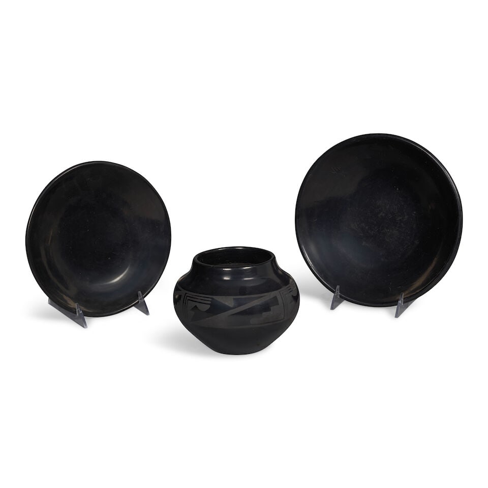 Three San Ildefonso blackware pottery objects, Martinez family: Three San Ildefonso blackware pottery objects, Martinez family Including two plates, each polished, the larger by Maria Martinez (1887-1980) and Julian Martinez (1879-1943), with scratches and wear; t