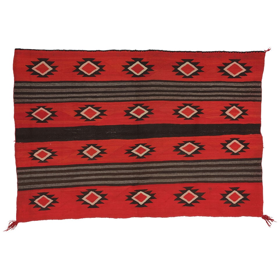 A Diné (Navajo) woman's wearing blanket-style weaving (1 of 2)