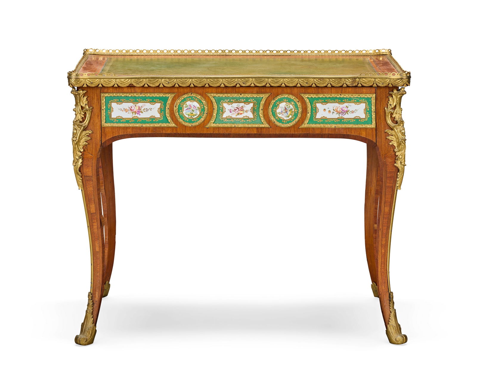 An early Victorian Sevres style porcelain and ormolu mounted tulipwood writing table or small bu...: An early Victorian Sevres style porcelain and ormolu mounted tulipwood writing table or small bureau plat Circa 1840, in the French taste, probably originally retailed by Edward Holmes Baldock The ove
