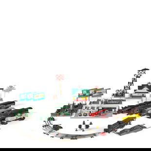 LARGE COLLECTION OF LIONEL MODEL TRAINS: LARGE COLLECTION OF LIONEL MODEL TRAINS Including metal and plastic train cars, train tracks, bridges, buildings, gardens, decorations, and billboards. Footnotes: OVERALL CONDITION: Good. Please note