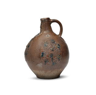 A very large Cologne stoneware bellarmine (Bartmannskrug), dated 1601: A very large Cologne stoneware bellarmine (Bartmannskrug), dated 1601Applied with a bearded mask below the rim, above the double-headed eagle of the Holy Roman Empire, the sides with oval medallions
