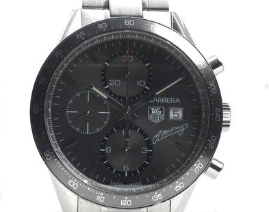 A limited edition Tag Heuer Carrera Calibre 16 'Juan Manuel Fangio' stainless steel automatic ch...: A limited edition Tag Heuer Carrera Calibre 16 'Juan Manuel Fangio' stainless steel automatic chronograph wristwatch, numbered to reverse 2320/4000, model number CV201C, offered together with instruct
