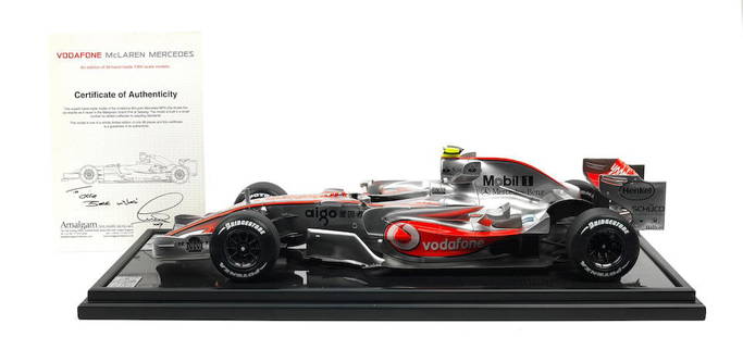 A 1:8 scale limited edition model of Lewis Hamilton's 2007 Malaysian Grand Prix McLaren Mercedes...: A 1:8 scale limited edition model of Lewis Hamilton's 2007 Malaysian Grand Prix McLaren Mercedes MP4-22A, by Amalgam, depicting the car driven to 2nd place by Hamilton and his first ever fastest lap i
