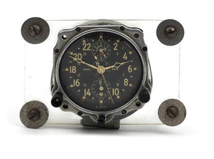 A Jaeger Le Coultre A-10 (Chronoflite) elapsed time aircraft clock for the US Navy, 1940s,: A Jaeger Le Coultre A-10 (Chronoflite) elapsed time aircraft clock for the US Navy, 1940s, 13 Jewelled movement, black dial with Arabic numerals and 3 subsidiary dials including Civil Date, (left push