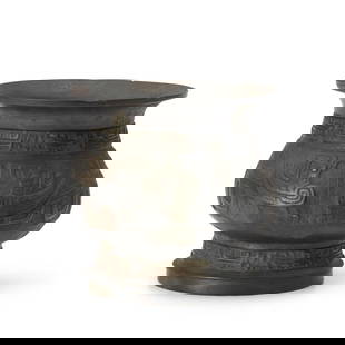 AN ARCHAISTIC BRONZE ZHI VESSEL China, Late Qing/early Republic period: AN ARCHAISTIC BRONZE ZHI VESSEL China, Late Qing/early Republic period  6 7/8in (17.5cm) high Footnotes: Provenance: The estate of Mrs. Greenwald, art collector and business owner, purchased from Hong