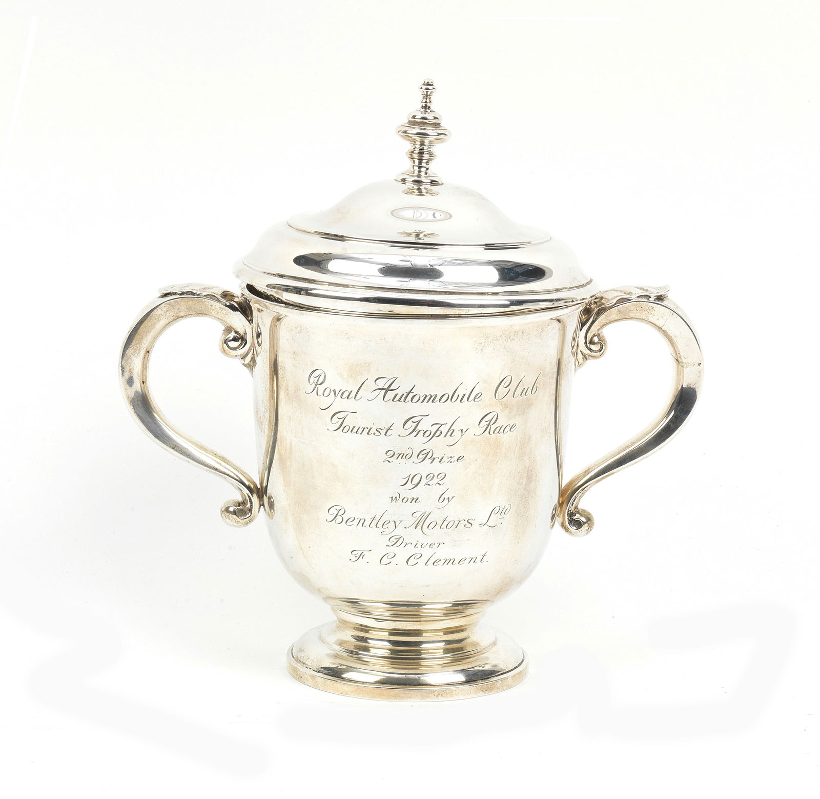 A Royal Automobile Club 1922 Tourist Trophy 2nd place sterling silver trophy, team award present...: A Royal Automobile Club 1922 Tourist Trophy 2nd place sterling silver trophy, team award presented to Bentley Motors, George V twin-handled trophy with lid and finial by Charles & Richard Comyns, hall