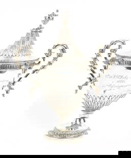 A BARC Brooklands 1924 90MPH Long Handicap 1st place sterling silver trophy, ((2)): A BARC Brooklands 1924 90MPH Long Handicap 1st place sterling silver trophy, George V twin-handled trophy with lid with amphora finial by Charles & Richard Comyns, hallmarked London, 1924, inscribed t