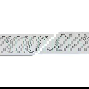 A RICHARD SIMMONS 'SLIMMONS' ALUMINUM AND WOOD SIGN: A RICHARD SIMMONS 'SLIMMONS' ALUMINUM AND WOOD SIGN height 10 1/2in; width 74in; depth 18 1/8in Footnotes: Hung above the door of Richard Simmons's Beverly Hills workout studio. Opened in 1974 as The