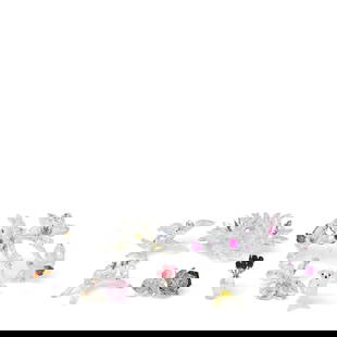 A GROUP OF SWAROVSKI CRYSTAL TABLE ORNAMENTS21st century: A GROUP OF SWAROVSKI CRYSTAL TABLE ORNAMENTS 21st century Comprising Orchids on a Vine by Stefanie Nederegger, Maxi Flower Arrangement by Michael Stamey, Butterfly on Flower by Elke Kumar, and