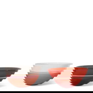 SONJA BLOMDAHL (AMERICAN, BORN 1952): TWO COLORED AND CLEAR GLASS BOWLS1990s: SONJA BLOMDAHL (AMERICAN, BORN 1952): TWO COLORED AND CLEAR GLASS BOWLS 1990s Comprising a peach and white example signed and inscribed Sonja / B9983 and a red and orange example signed and inscribed