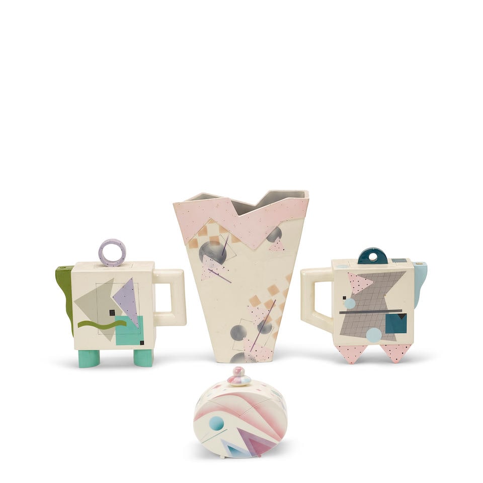 RITA DUVALL (AMERICAN, 1959-2004): A GROUP OF POST-MODERN CERAMIC TABLE ARTICLES1980s: RITA DUVALL (AMERICAN, 1959-2004): A GROUP OF POST-MODERN CERAMIC TABLE ARTICLES 1980s Comprising a vase and two teapots, each with various inscriptions, together with a ceramic covered sugar bowl sig