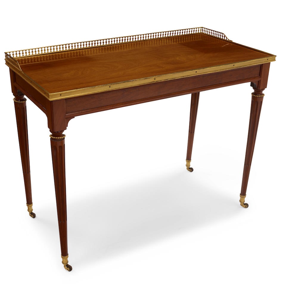 A LOUIS XVI GILT BRONZE MOUNTED MAHOGANY SIDE TABLEMathieu-Guillaume Cramer (French, died c. 179... (1 of 2)